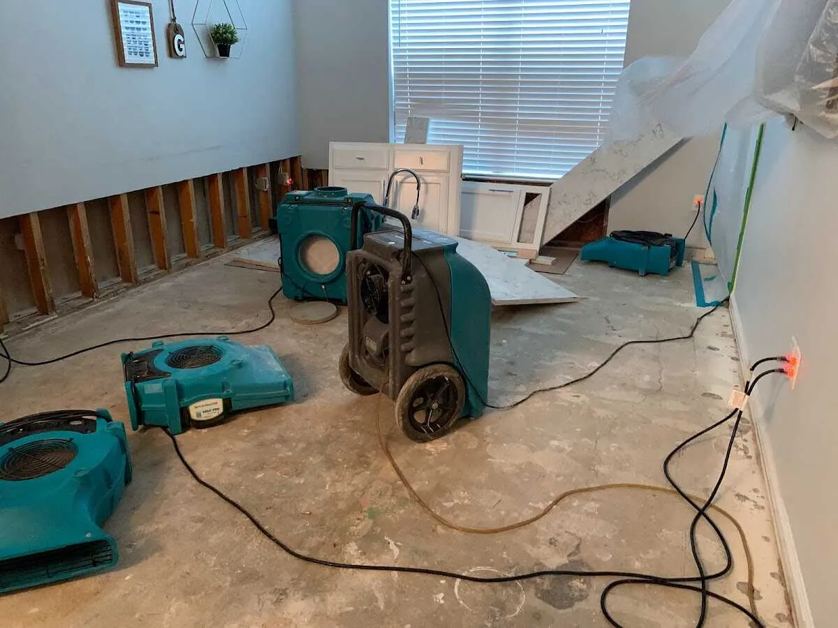 Dehumidifier in flood-cut room for Water Damage Restoration in Tinton Falls